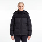 Cord Puffer Jacket för dam i svart, kvinna framifrån mot vit bakgrund