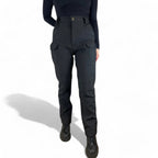 OUTDOORS NORDIC black fleece-lined utility pants with multiple cargo pockets and a durable, windproof stretch fabric.