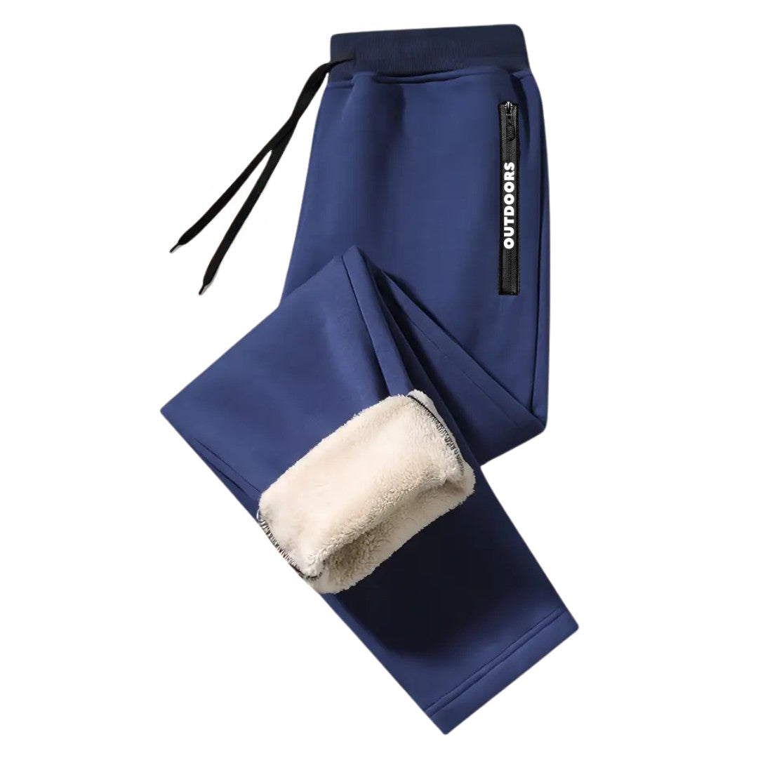 OUTDOORS NORDIC navy blue fleece-lined sweatpants with an elastic drawstring waist and zippered side pocket.