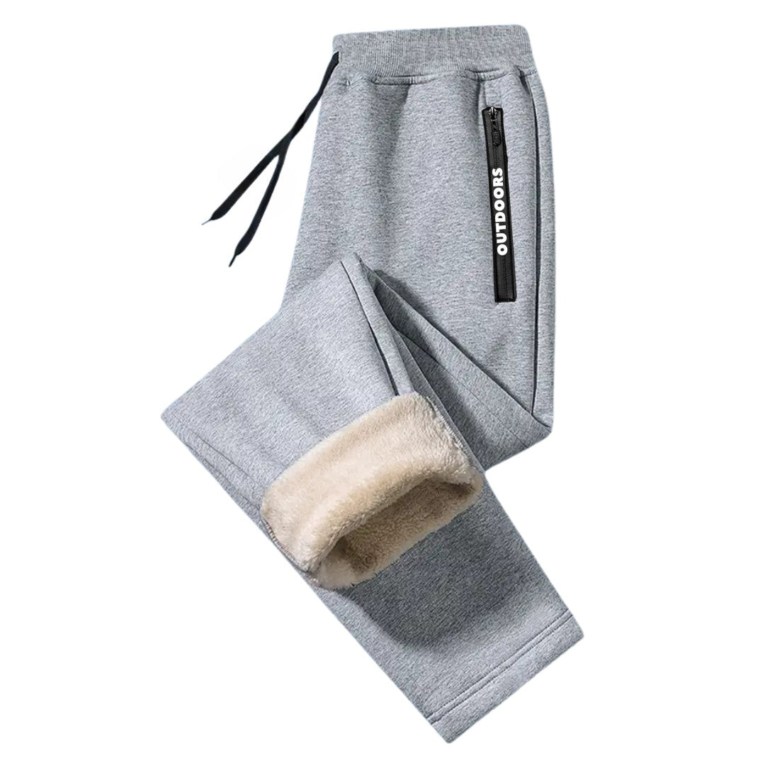 OUTDOORS NORDIC grey fleece-lined sweatpants with an elastic drawstring waist and a zippered side pocket.