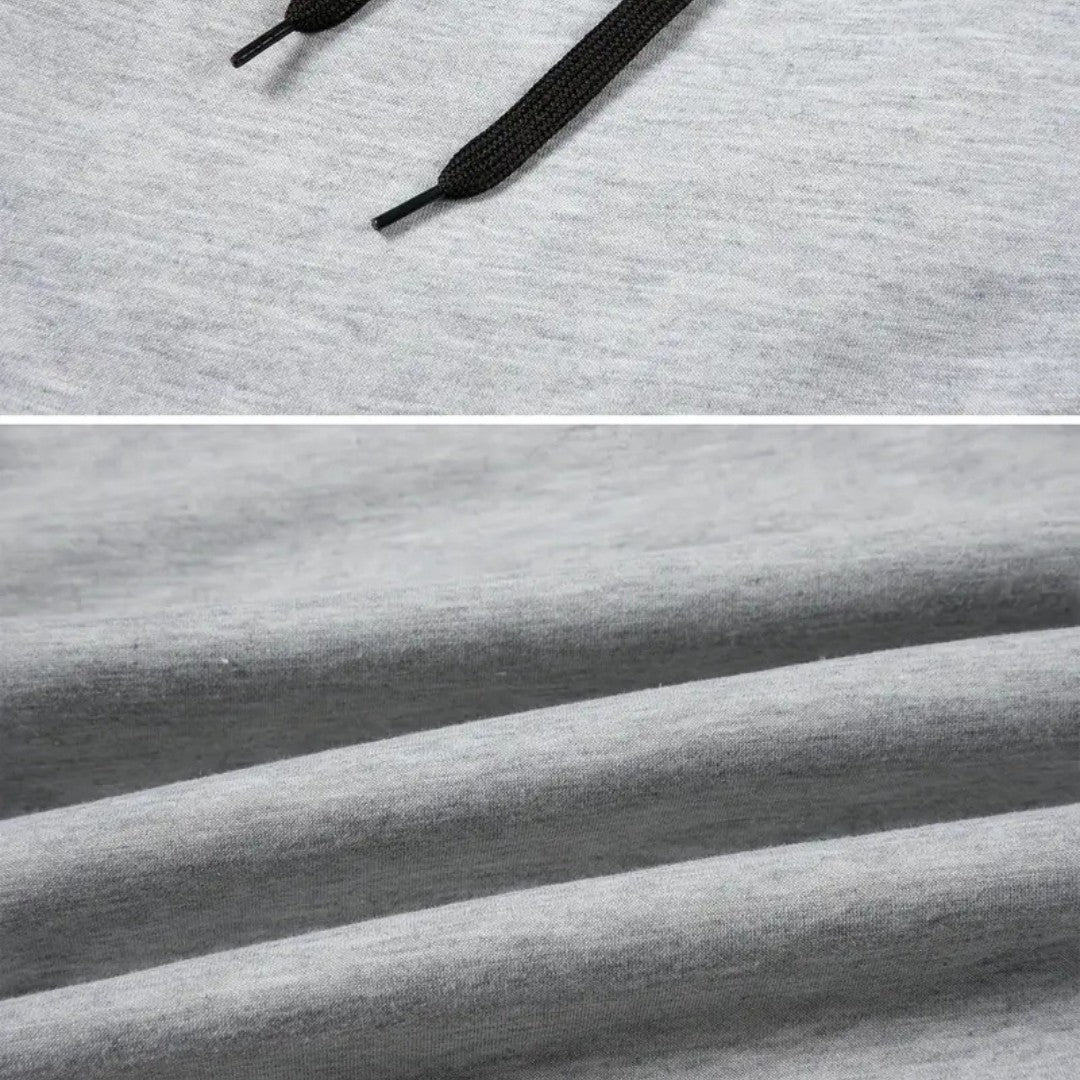 OUTDOORS NORDIC grey fleece 24/7 pants featuring a soft textured fabric and an adjustable black drawstring waistband.