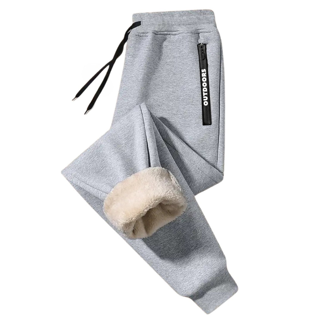 OUTDOORS NORDIC grey fleece-lined sweatpants with an elastic drawstring waist and zippered side pocket.