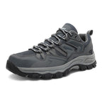 OUTDOORS NORDIC grey low-top hiking shoes with breathable mesh, orthopedic support, and durable TPU grip soles.