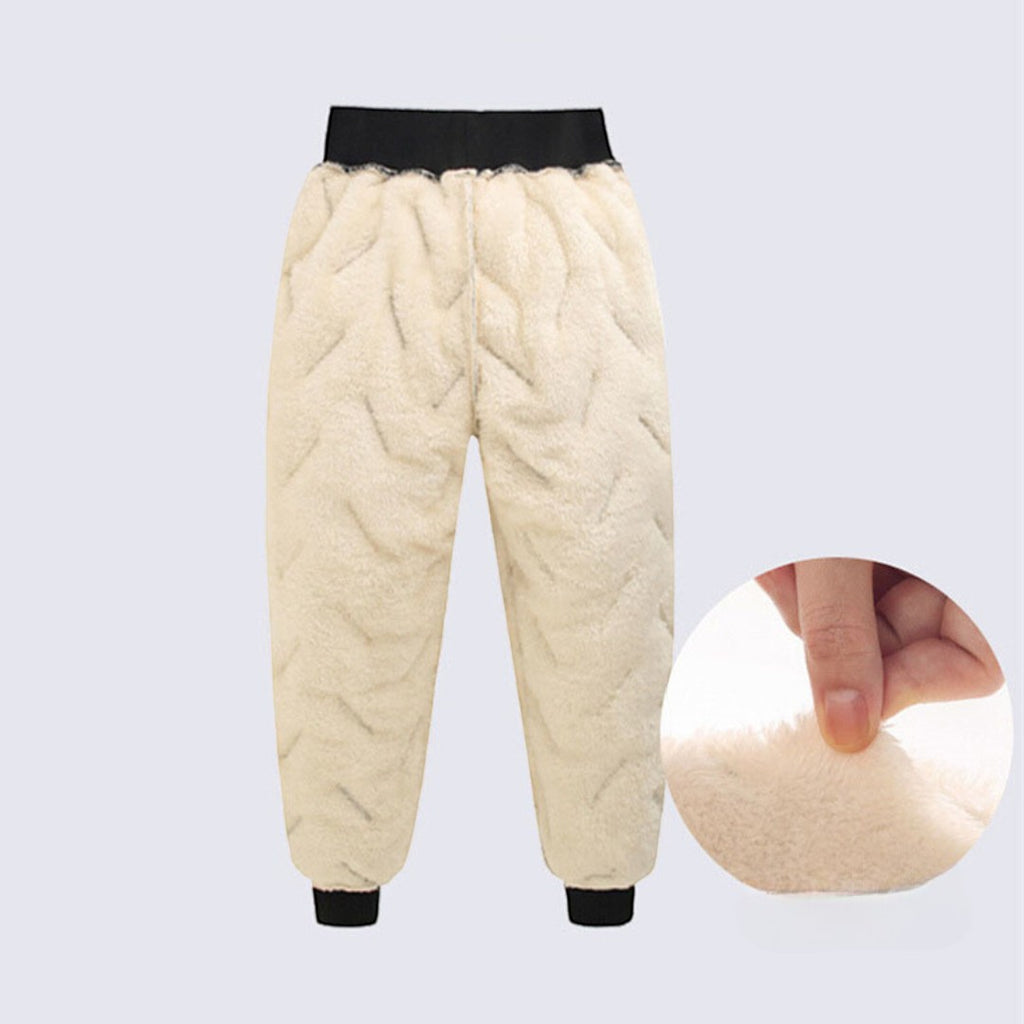 OUTDOORS NORDIC kids' cream-colored fleece-lined winter pants with a quilted texture and black elastic cuffs.