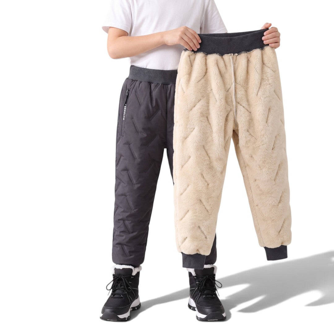 OUTDOORS NORDIC kids' winter fleece pants with a quilted grey exterior and soft beige faux fur lining