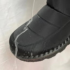 OUTDOORS NORDIC waterproof black winter boot with water beading on the fabric surface