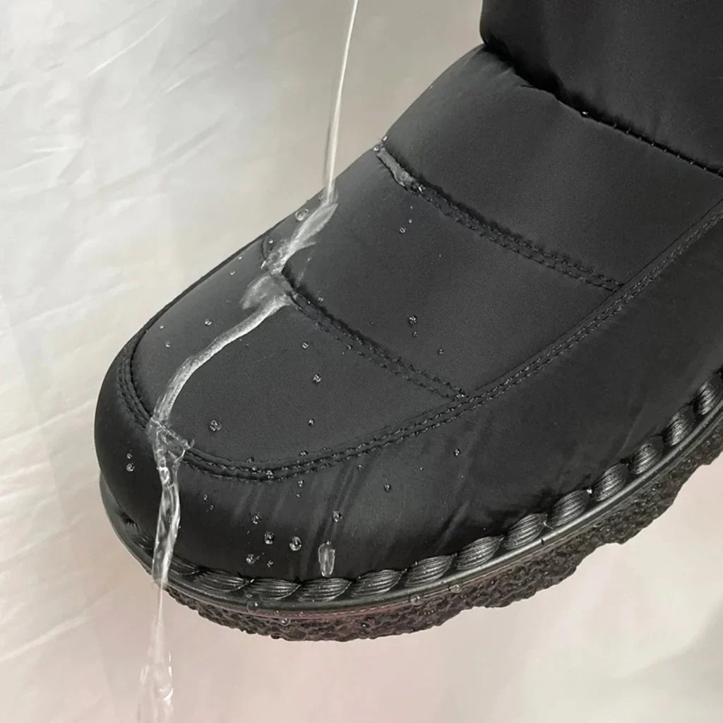 OUTDOORS NORDIC waterproof black winter boot with water beading on the fabric surface