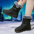 OUTDOORS NORDIC waterproof black winter boots with faux fur trim, flannel lining, and non-slip soles in snowy setting