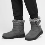 OUTDOORS NORDIC waterproof grey winter boots with faux fur trim, warm flannel lining, and non-slip rubber soles.