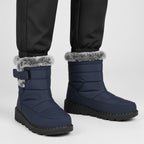 OUTDOORS NORDIC waterproof navy blue winter boots with faux fur trim, flannel lining, and easy velcro closure.