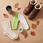 Thermo Warm Insoles bredvid vinterkängor och ullsockor